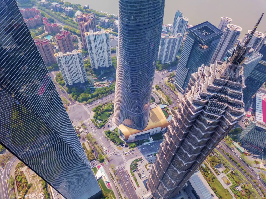 Aerial view of skyscraper and high-rise office buildings in Shanghai Downtown, China. Financial district and business centers in smart city in Asia.