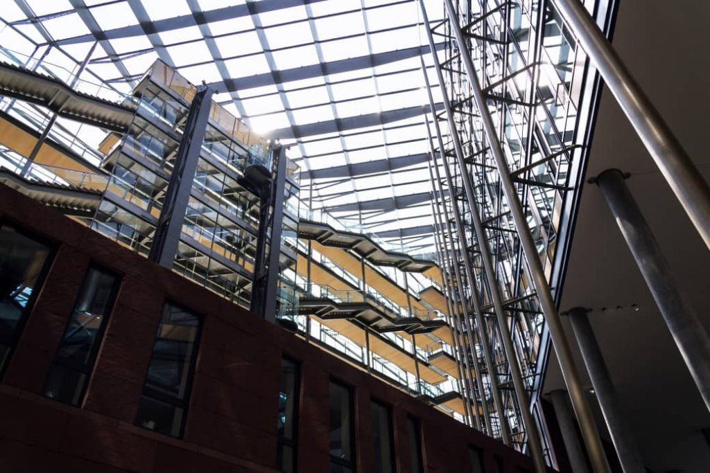 Building architecture with glass glazed roof.