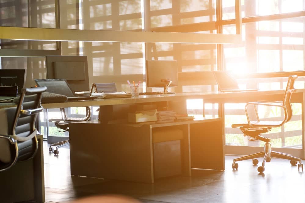 Brightly lit open plan office.