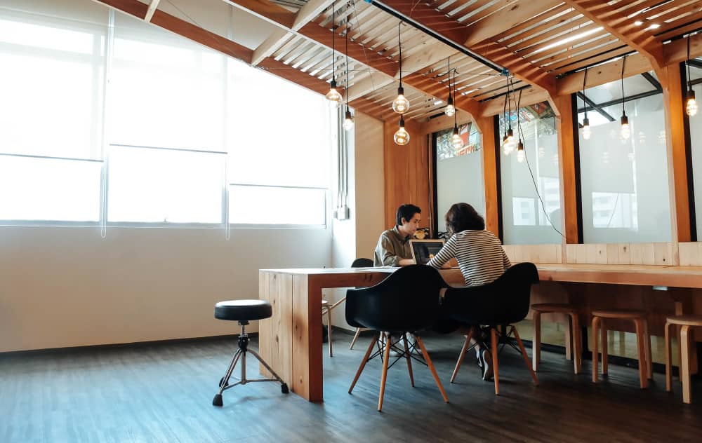 Hot desking freelancers in a coworking space.