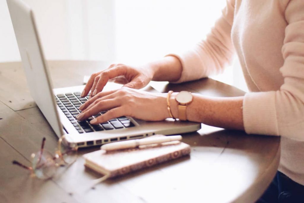 A founder working in a coworking shared space where there is no need to worry about desks not being used.