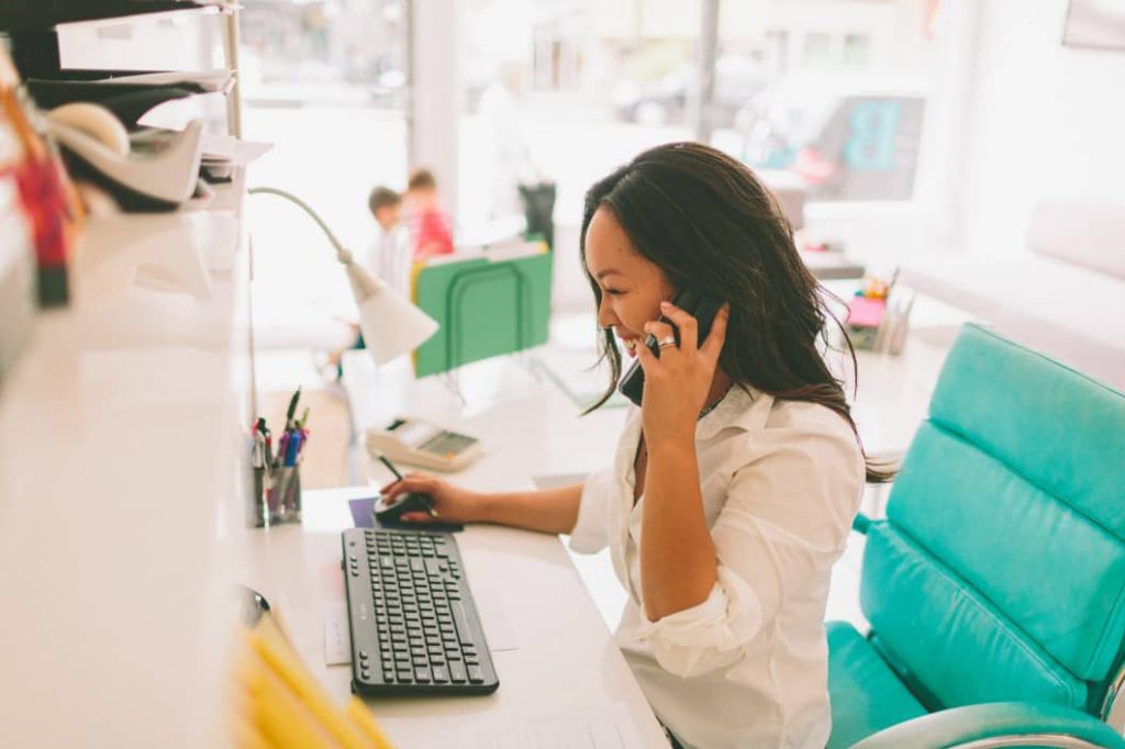 A business owner working out from a shared office space not having to worry about additional financial costs of running a dedicated office space.