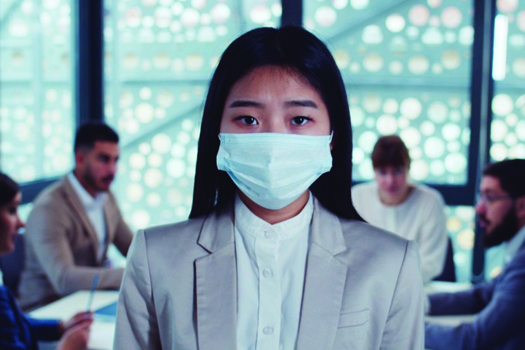 asian businesswoman wearing facemask