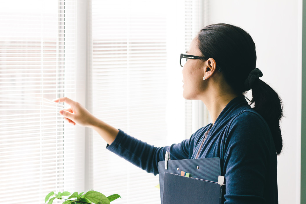 hr professional - virtual office space rental - an employee inspects an office space in singapore